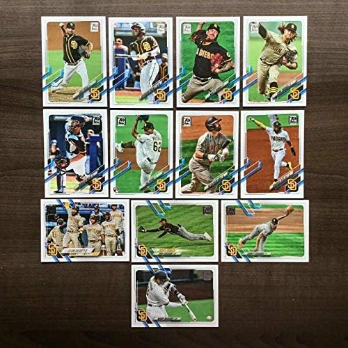 2021 Topps Series 1 Baseball San Diego Padres Base MLB Hand Collated Team Set in Near Mint to Mint Condition of 12 Cards: 1 Fernando Tatis Jr. - 38 Mitch Moreland - 140 Garrett Richards - 192 Manny Machado - 205 Luis Patiño RC - 248 Francisco Mejia 249 Trent Grisham Future Stars - 259 Chris Paddack - 265 Mike Clevinger - 266 Jurickson Profar - 267 Kirby Yates - 323 Slam Diego