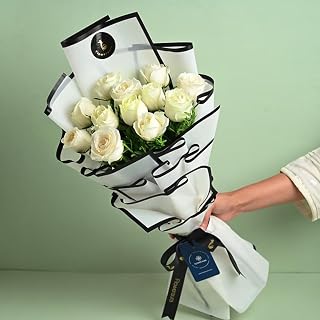 FlowerAura Premium Fresh Live Flower Bouquet of 12 White Roses In Designer Paper Gift For Birthday | Anniversary | Love | Price In India