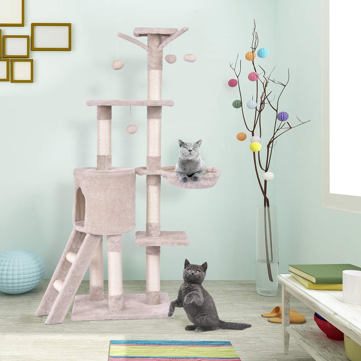 Cat tree in a room with two cats