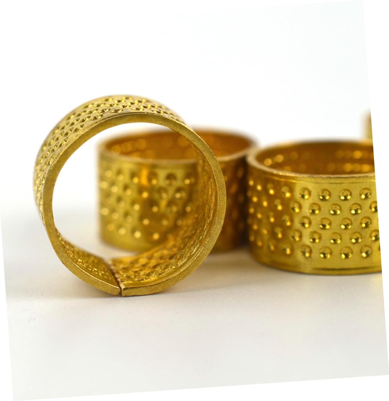 KALLORY 60pcs Golden Quilting Thimble Skid-Resistant Finger Protectors for Sewing Crafts Thimble Shield for Canvas Repair Essential Sewing Tools