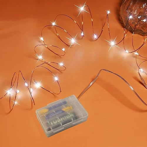RUICHEN Guirnalda de luces que funcionan con pilas, alambre de cobre de 16.4 pies, 50 luces LED, mini luciérnaga, luces estrelladas para dormitorio,