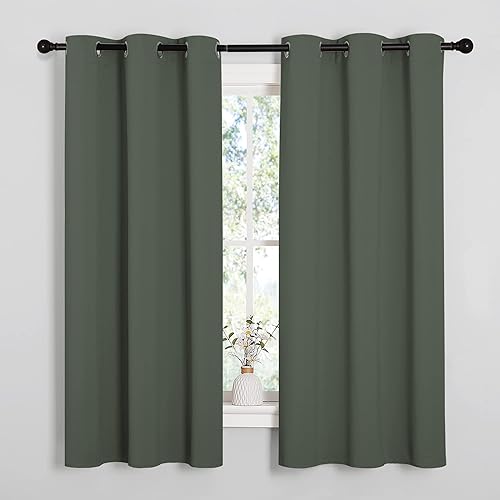NICETOWN - Paneles de cortinas opacas con aislamiento térmico y ojales sólidos para decoración del hogar o comedores (color azulón, 1 par, 42 x 63