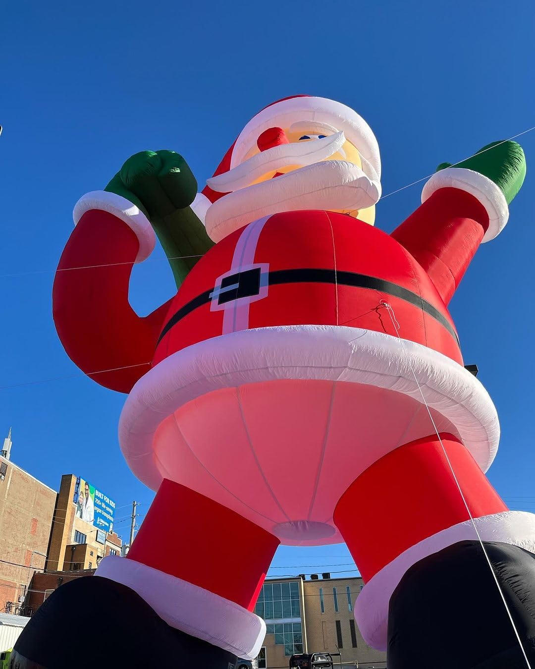 OZIS Giant 26Ft Inflatable Santa Claus Holding Bag with Blower Outdoor Decorations, Huge Inflatable Santa Blow Up Yard Décor for Holiday Patio Lawn