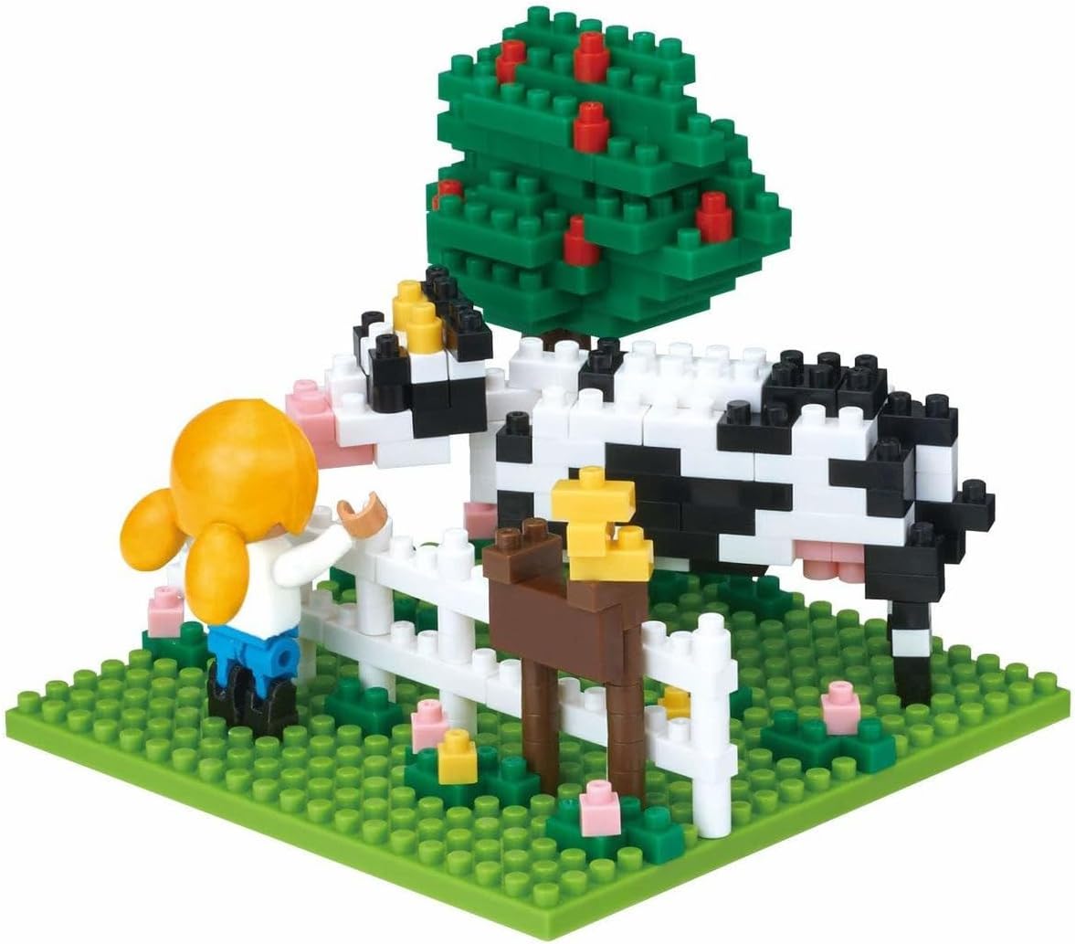 Side view of the Nanoblock Farm, highlighting the cow and the green baseplate.