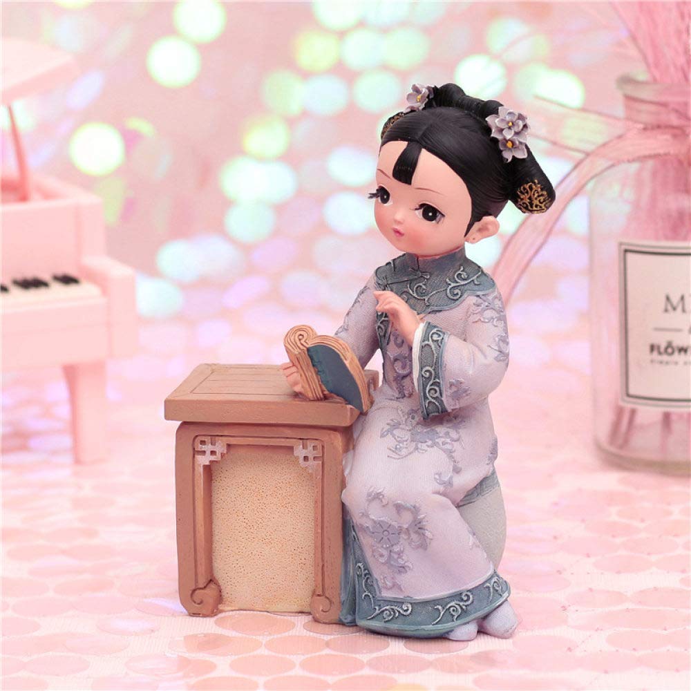 Statue de fille lisant en résine : mini figurine déco pour maison et bureau