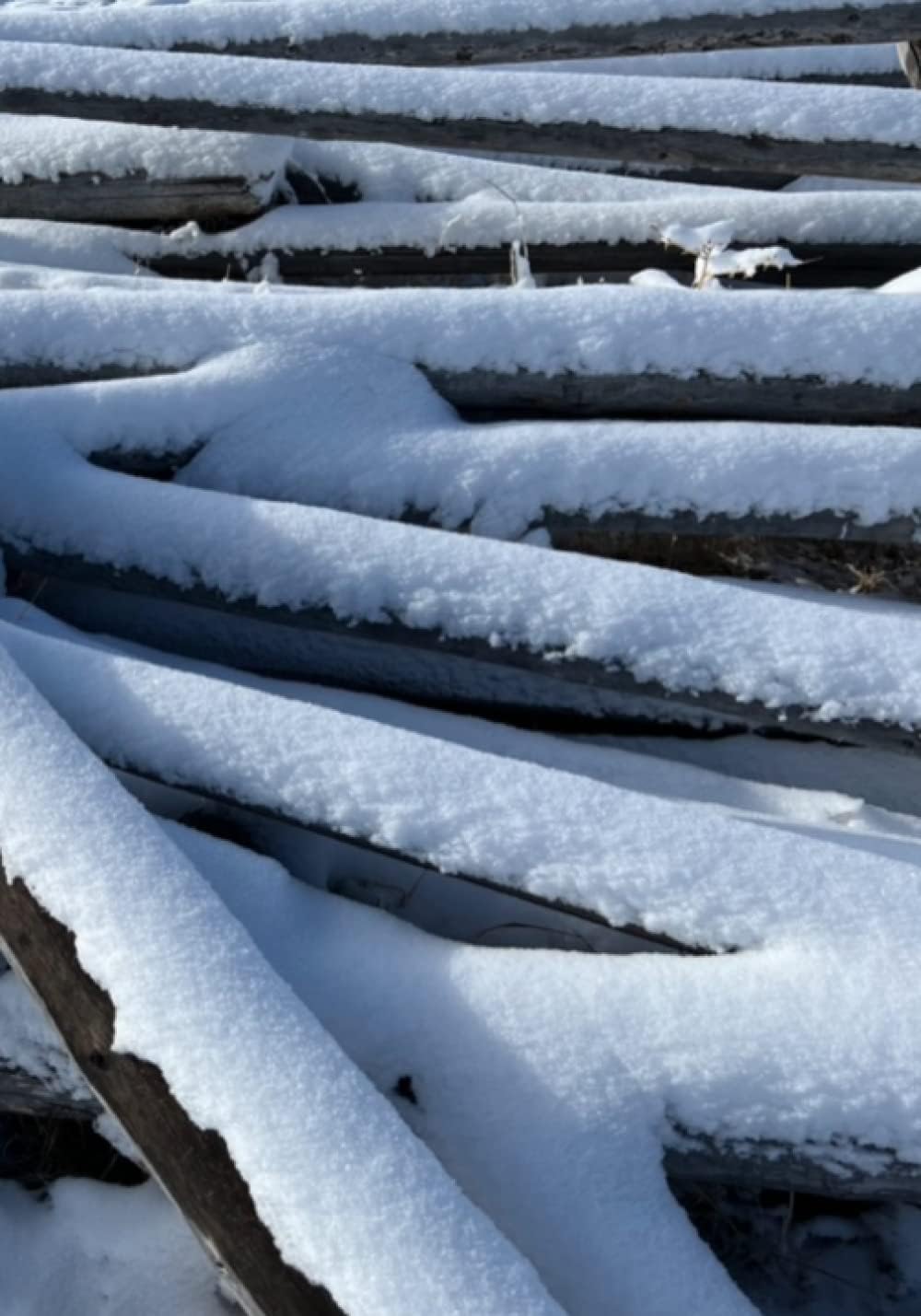 Notebook: Snow covered fence posts for firewood. Wide ruled notebook. 100 pages (50 sheets). Format 7x10 (17.78x25.4 cm) (Wild West Collection)