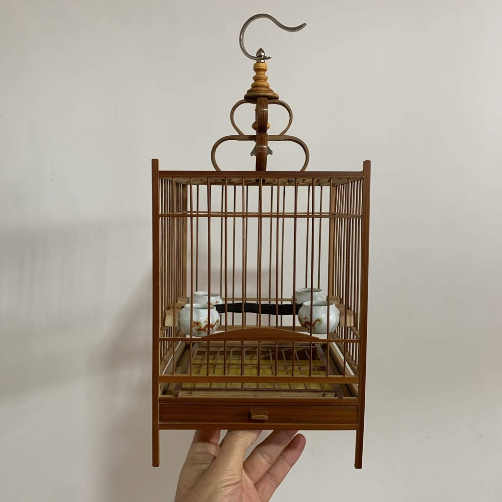 Cage de voyage pour oiseaux idéale pour les déplacements en vacances