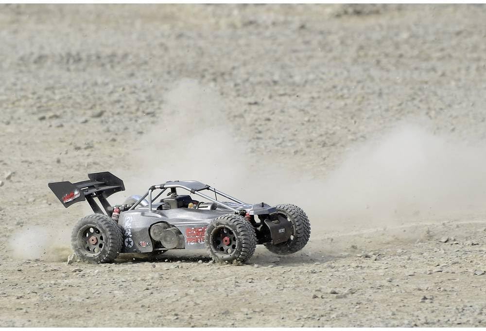 REELY Carbon Fighter III RC Buggy driving on dirt