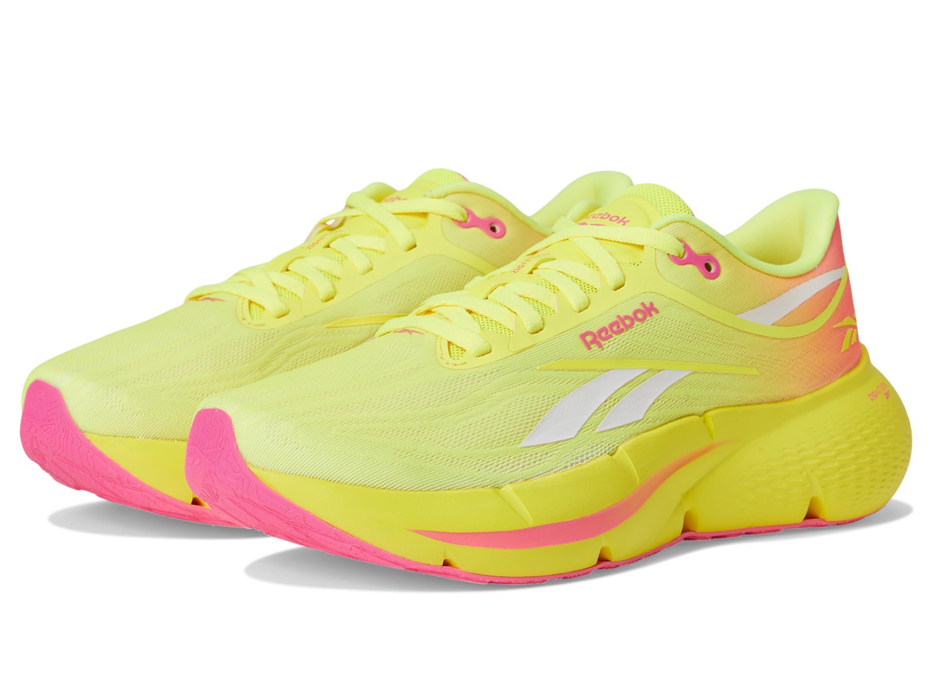 Reebok Women's Zignition Sneaker, Electric Yellow/Atomic Pink/Chalk, 7