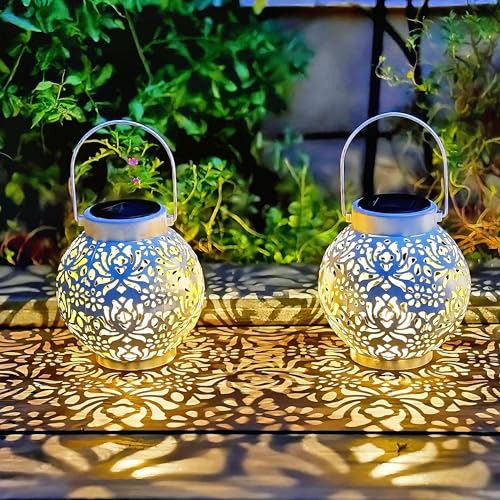 Image of 2 Pack Outdoor Solar Hanging Lantern Lights Metal LED Decorative Lamp for Garden Patio Courtyard Lawn and Table with Hollowed-Out Design (White)