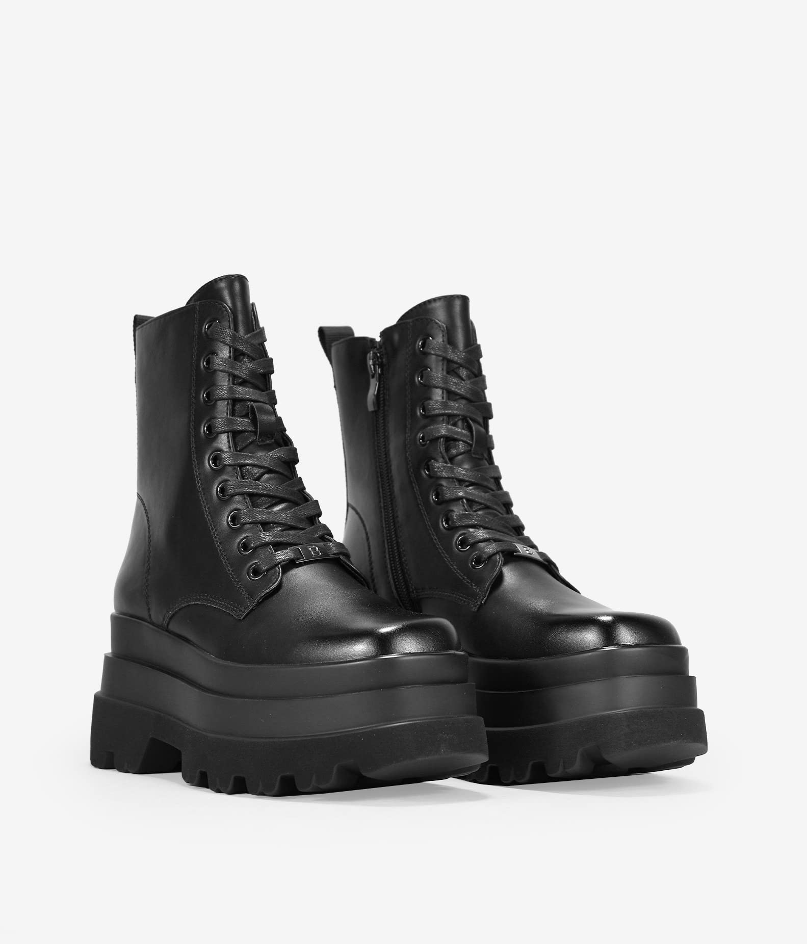 BOSANOVA Botines Militares confeccionados en Piel Vegana con Doble Plataforma y Suela Track. Cierre con Cremallera y Cordones. Calzado para Mujer