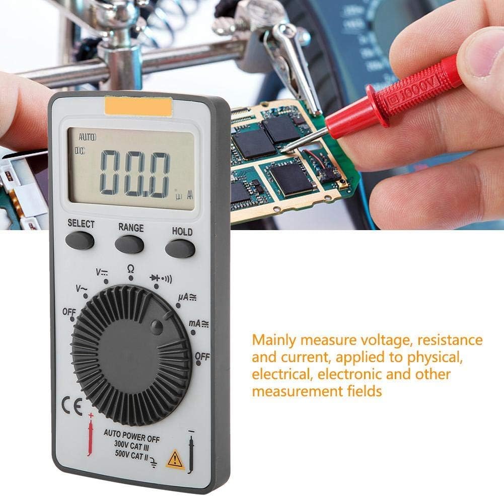 Person using the ANENG AN101 Digital Multimeter to test a circuit board.