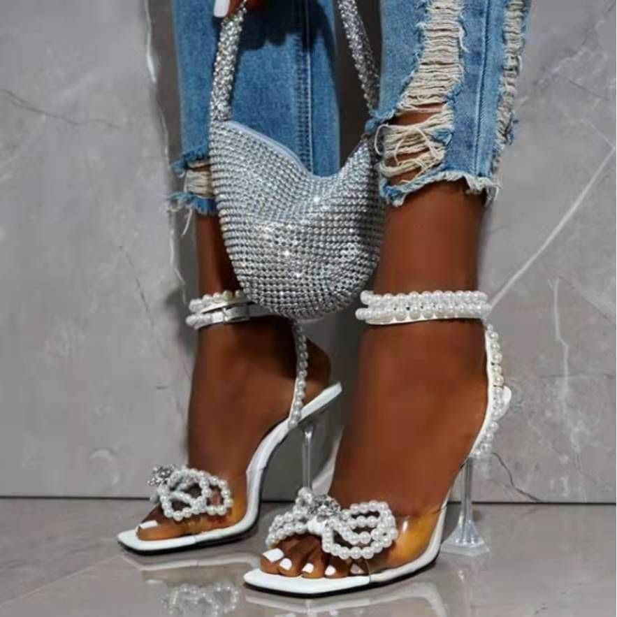 Image of Yolkomo Women's Square Toe Clear Heels Sexy Rhinestone Bow Heels Open Toe Ankle Strap Stiletto High Heel Sandals