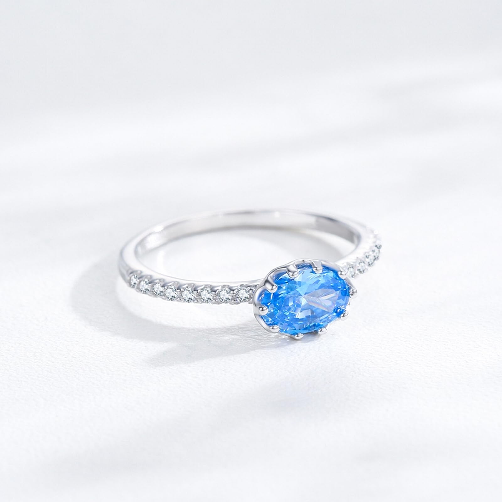 9K białe złoto pierścionek damski, pierścionek 7 x 5 mm topaz niebieski 1ct moissanit