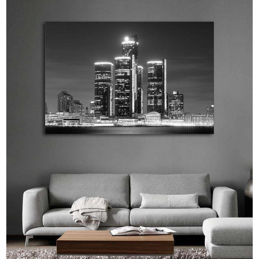 Toile Detroit Skyline au-dessus du canapé pour créer un salon style loft industriel