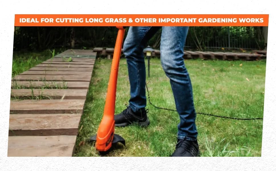 User operating the BLACK+DECKER GL350L String Trimmer in a garden