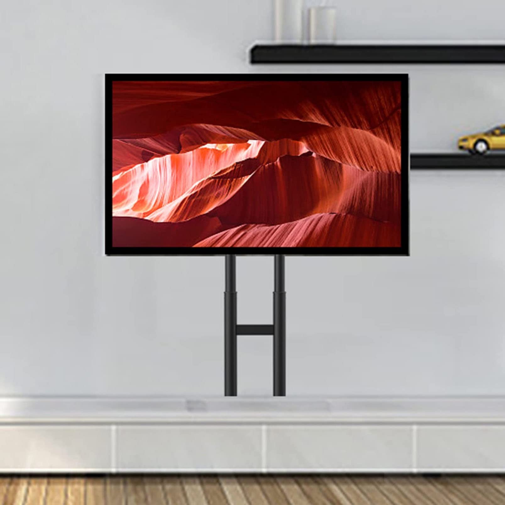 Support TV au sol pour grand écran 65 pouces avec gestion câbles et pied caoutchouc stable