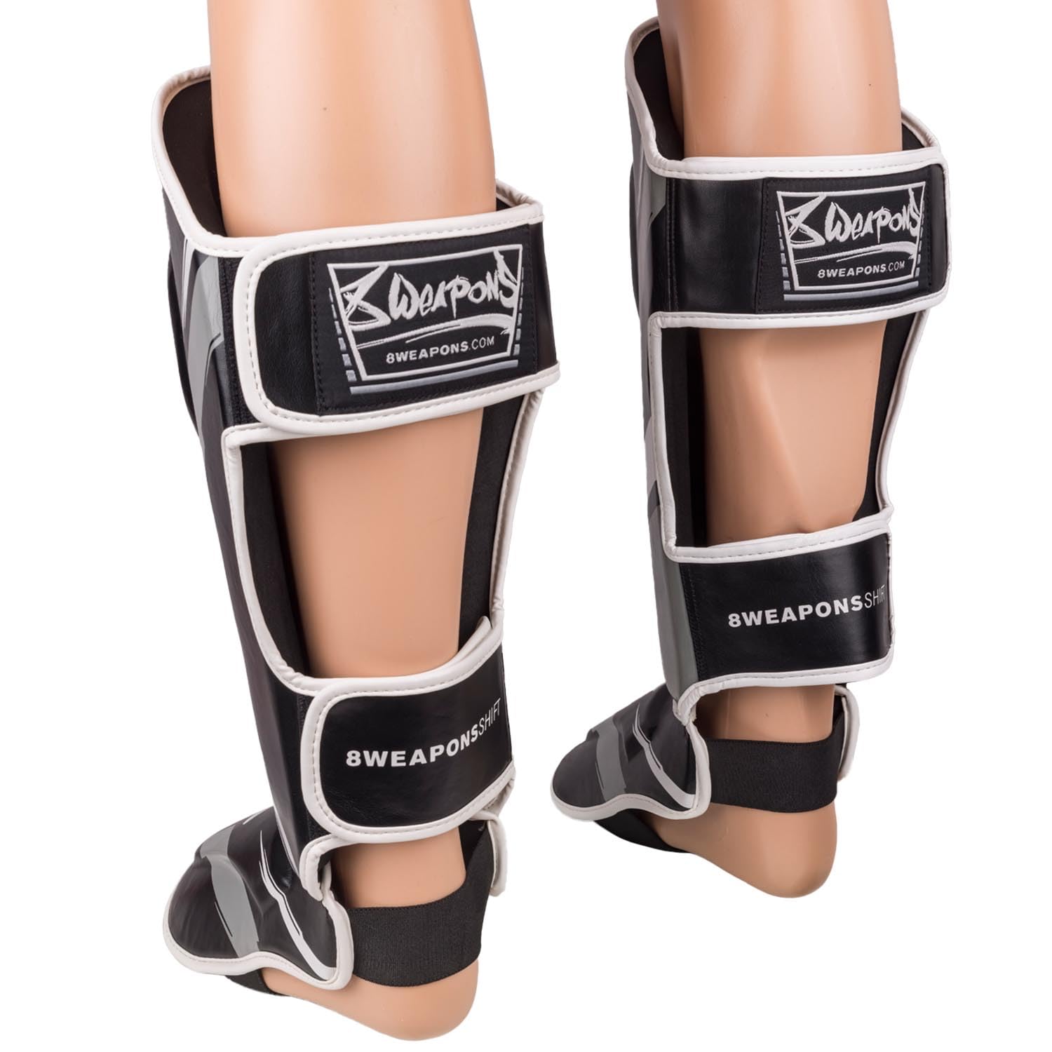 8 WEAPONS Espinilleras Shift, color blanco y negro, entrenamiento y competición, piel sintética de alta calidad y amortiguación perfecta, Muay Thai, K1, MMA, karate y kickboxing