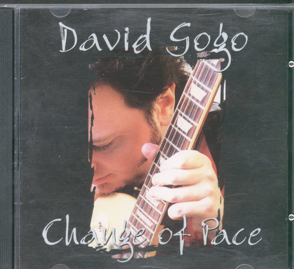 Change of Pace [Audio CD] David Gogo; Bill Hicks; Colin Nairne; Camille Miller; Rich Hopkins; Dennis Marcenko; Matt Frenette; Wendy Bird; Dave Reimer; Pat Steward; Barney Bentall and Bob Dylan