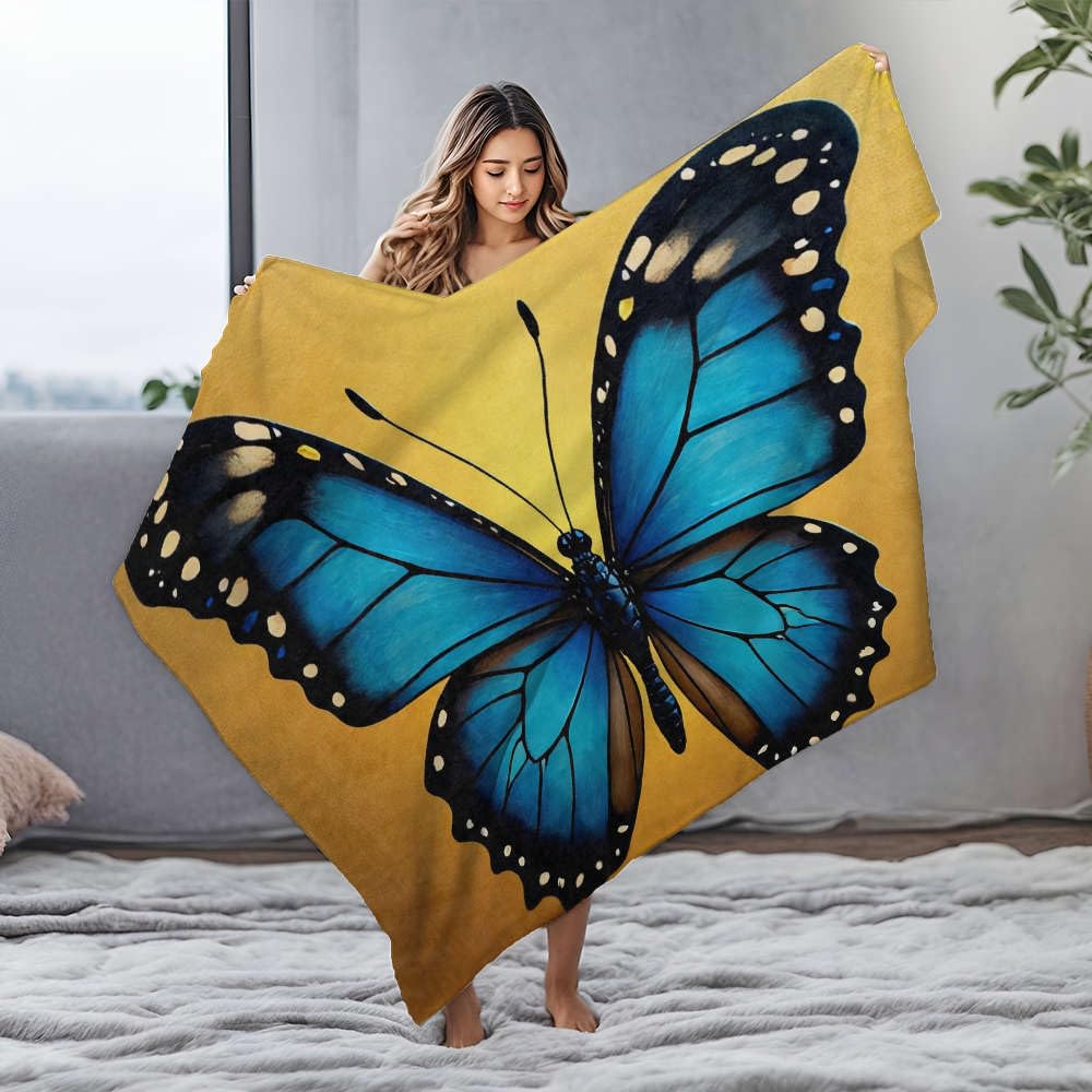 Couverture flanelle papillon bleu vif pour vos soirées cocooning