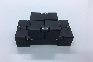A black 3-dimensional toy that can fold at right angles into cubes and other shapes