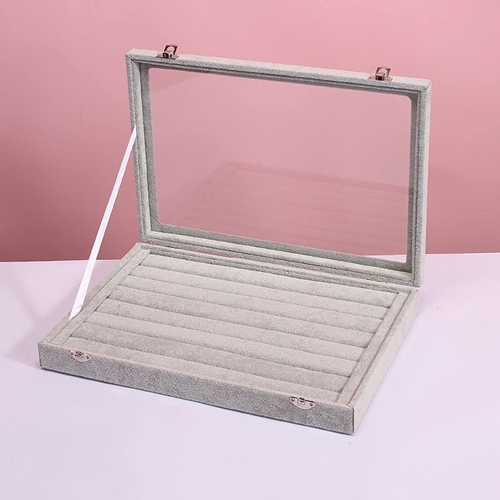 Rangement bijoux velours gris pour éviter les rayures et nœuds