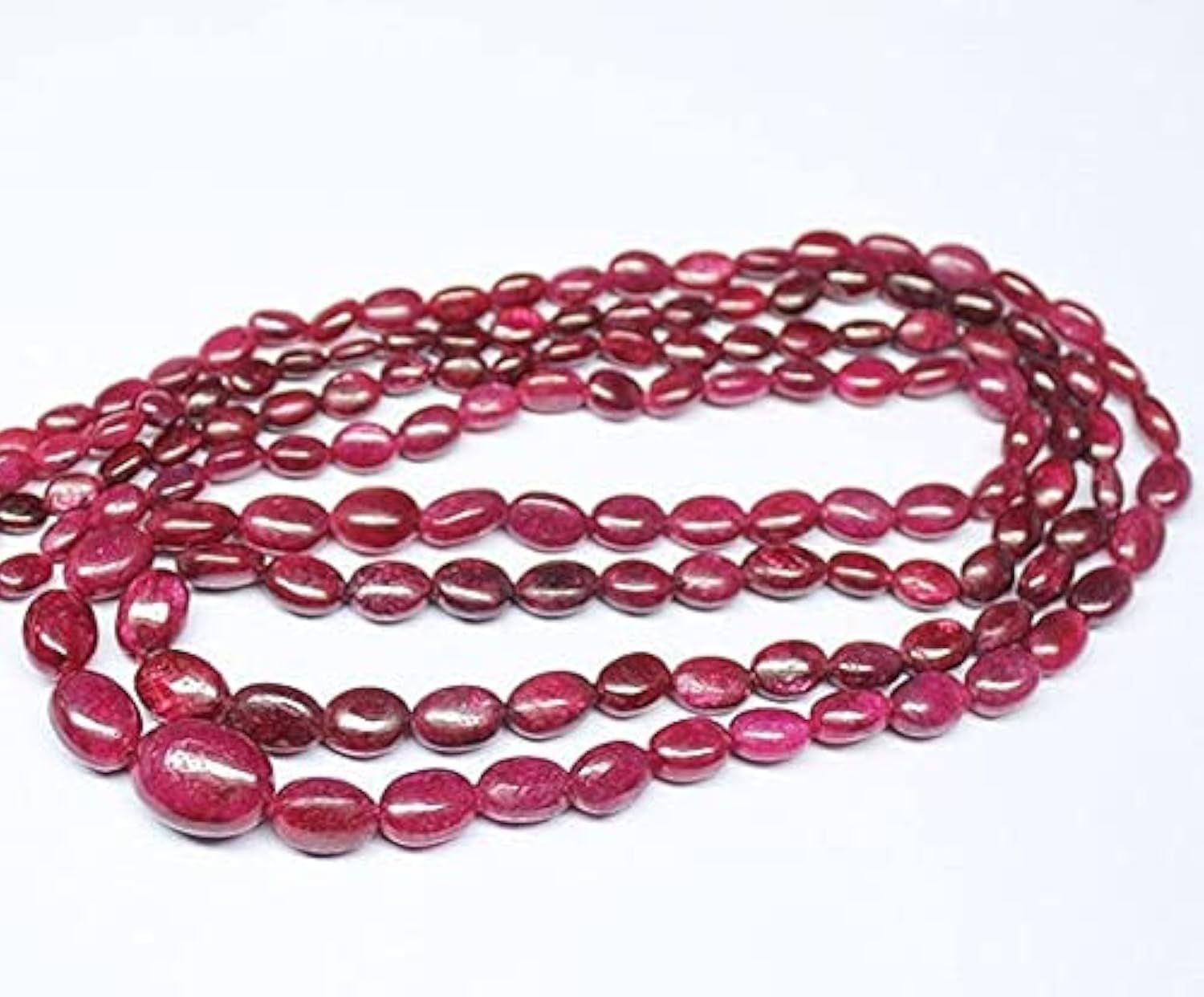 Rubis rouge sang naturel : perles ovales lisses pour création de bijoux