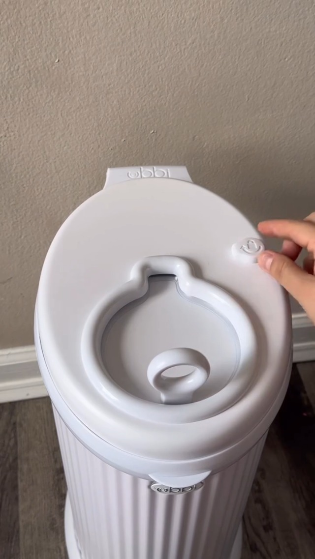 Image of Ubbi Stainless Steel Diaper Pail, No Special Bags, Odor-Locking, Fluted | Award-Winning Registry Must-Have, Childproof Safety Lid with Lock, Holds Up To 55 Newborn Diapers, Modern Nursery Essential