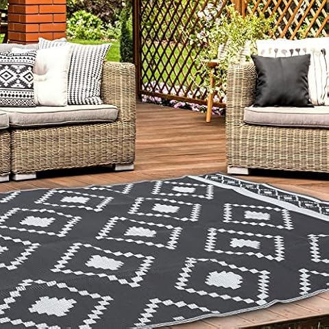 Cliselda Reversible Outdoor Rug 5' x 8', Waterproof Patio Rug, Plastic Straw Rug, Area Rug Mat, Large Floor Mat for RV, Patio, Backyard, Porch, Deck, Picnic, Beach, Trailer, Camping (Black and White) Cover