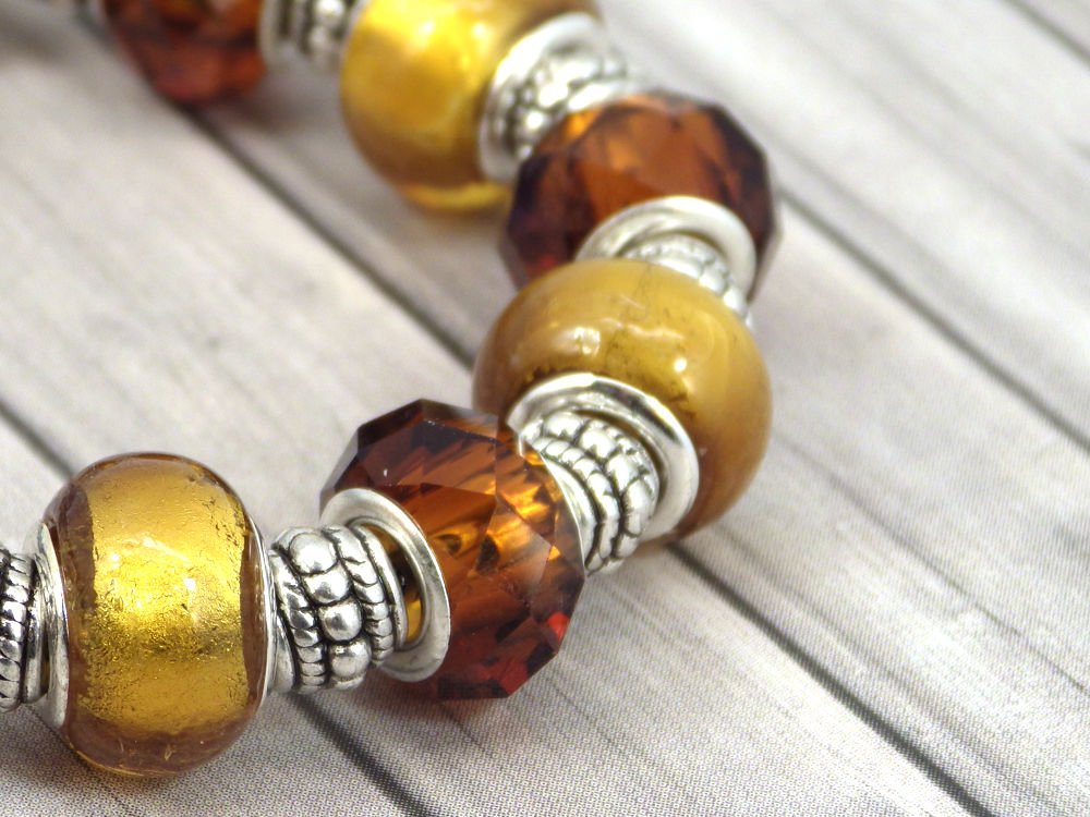 Pulsera de Charms de mujer Thurcolas Modelo Manhattan Acero Inoxidable con Cuentas de color Oro en Vidrio
