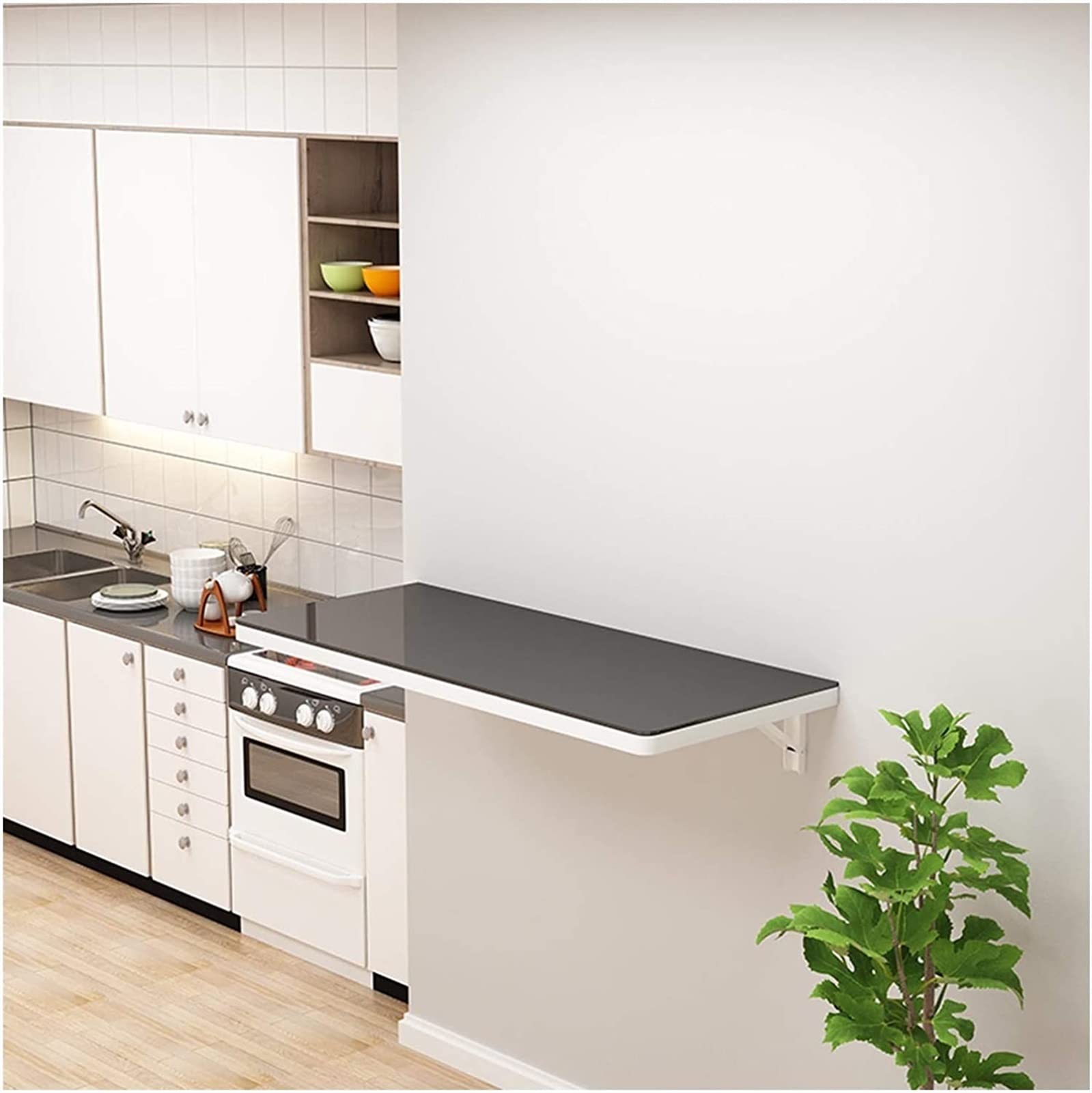 Table murale pliante pour cuisine et coin repas dans un petit studio
