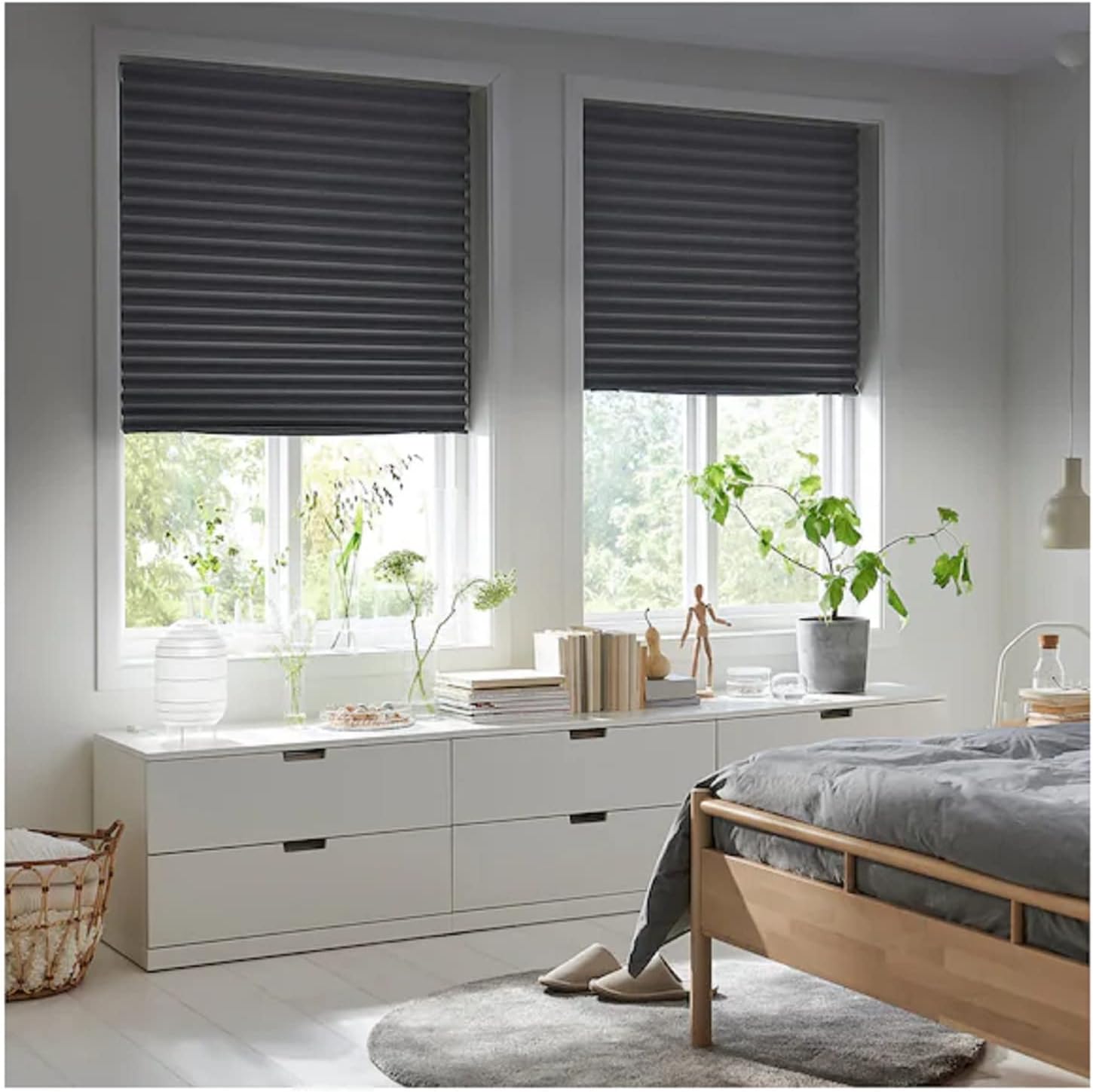 Two SCHOTTIS blinds installed in a bedroom window