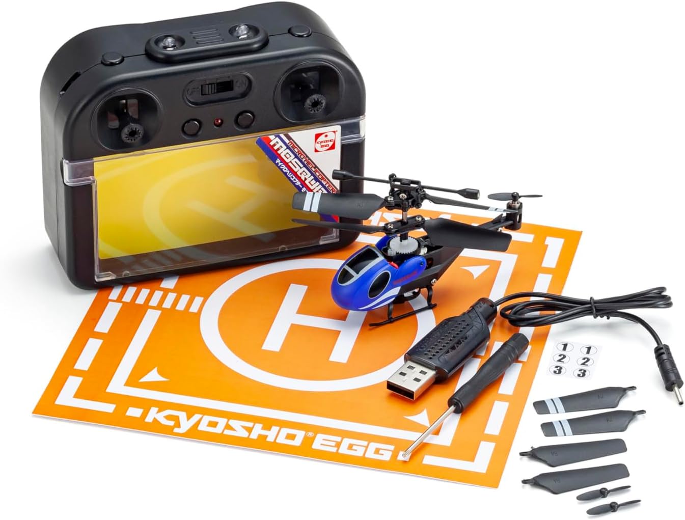 All components of the Kyosho Egg TS057 Micro Helicopter Mosquito package laid out, including the helicopter, transmitter, USB cable, screwdriver, and spare propellers.