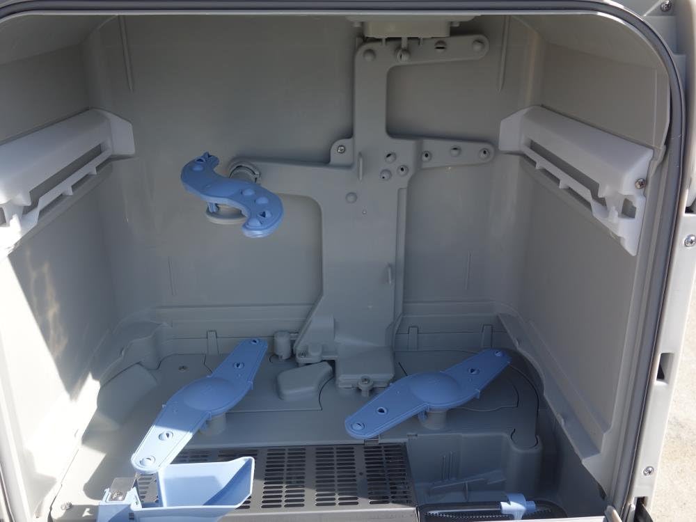 Interior view of Panasonic NP-TR3 Dishwasher showing dish racks