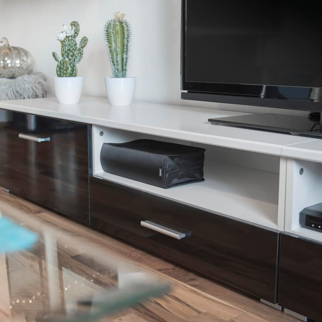 Hama CD/DVD/Blu-ray Wallet 120 stored in a media console