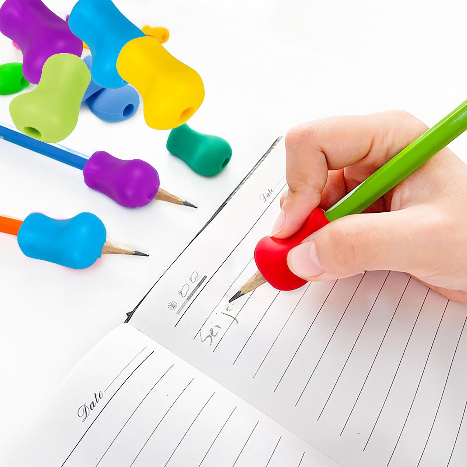 Aide à l'écriture pour stylos enfants, porte-stylos silicone ergonomiques pour gauchers ou droitiers, lot de 12 pièces