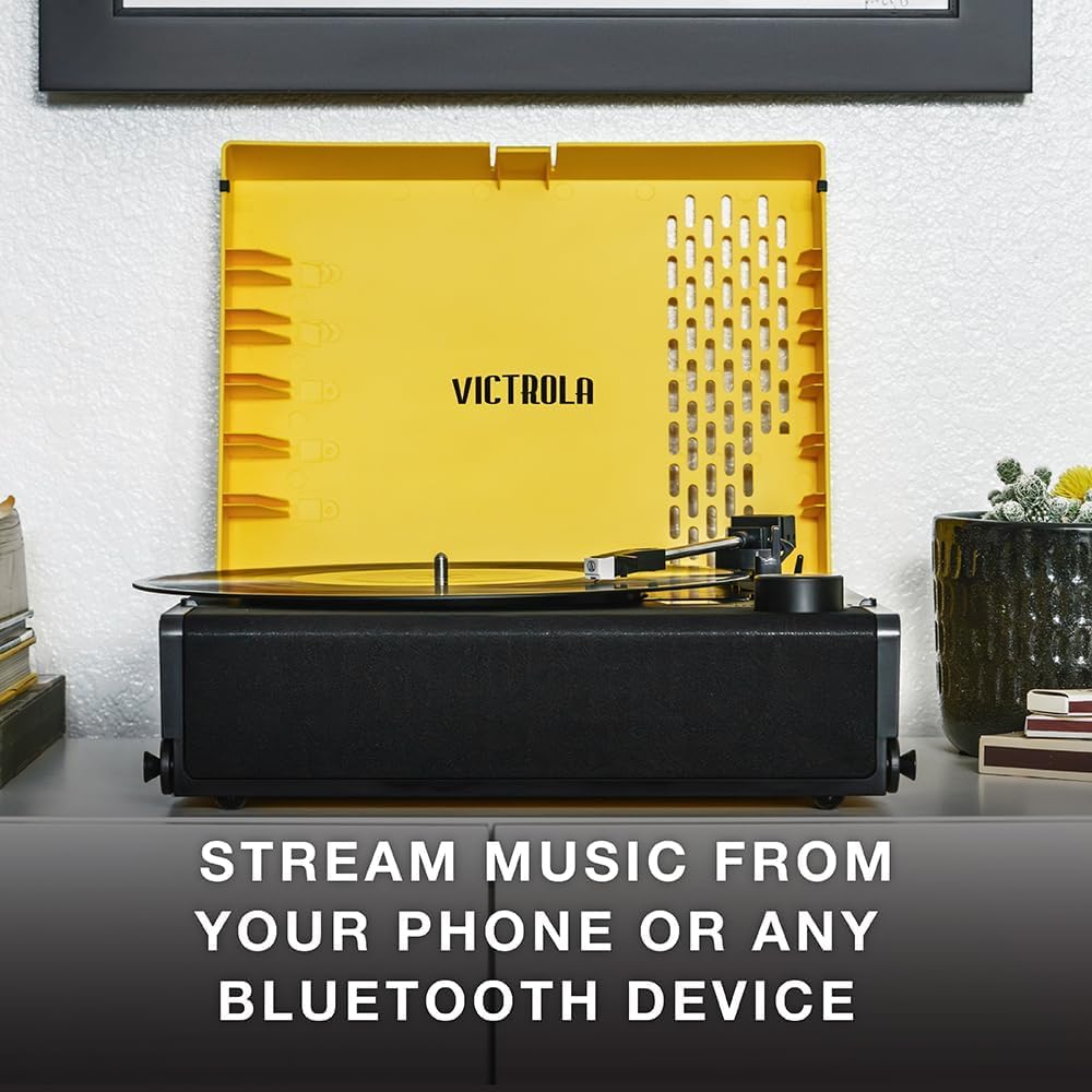 Victrola Revolution GO – przenośny gramofon Bluetooth z akumulatorem, 12 h pracy, 3 prędkościami, napędem paskowym, wyjściem RCA i gniazdem 3,5 mm (Czarny)