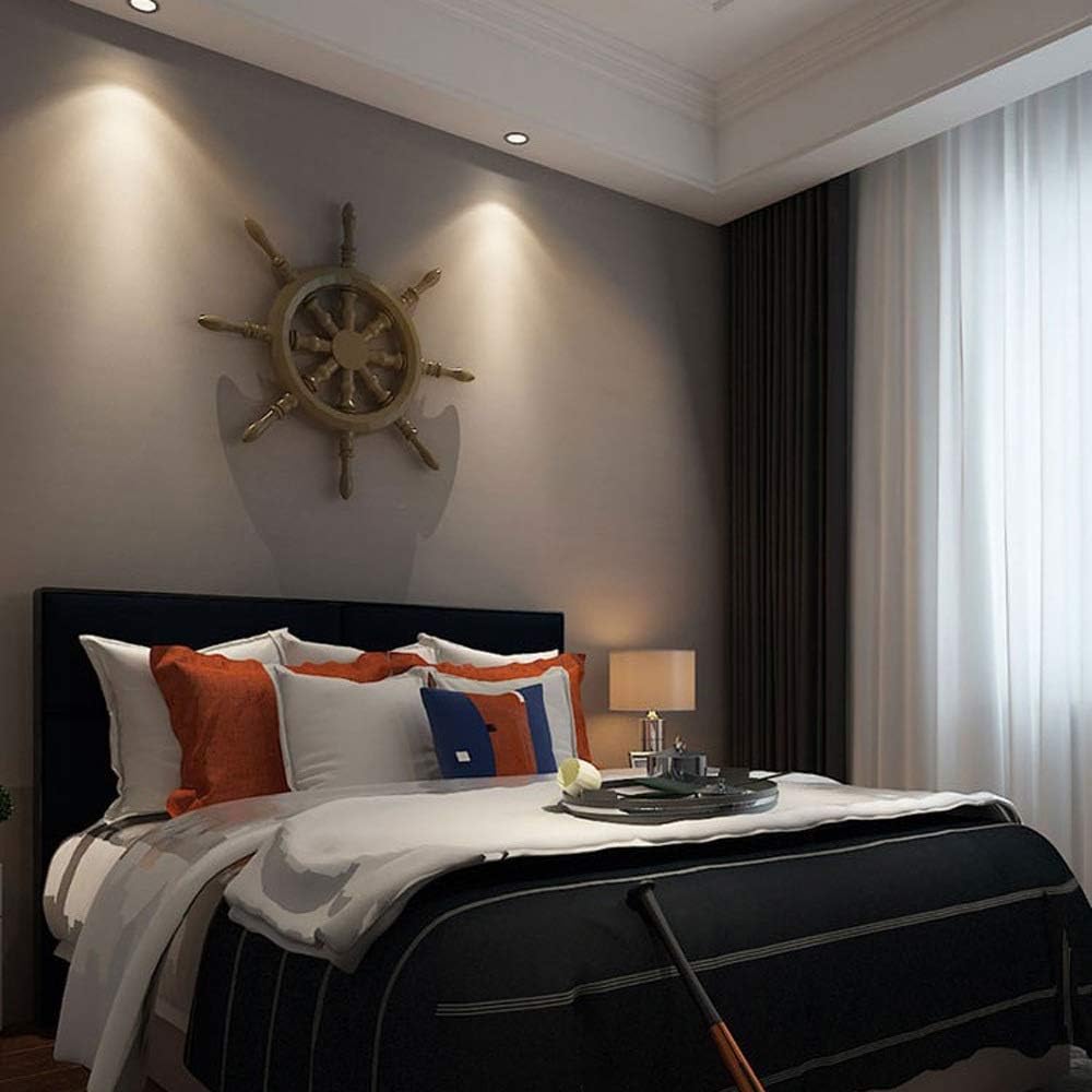 Recessed lights installed in a bedroom setting