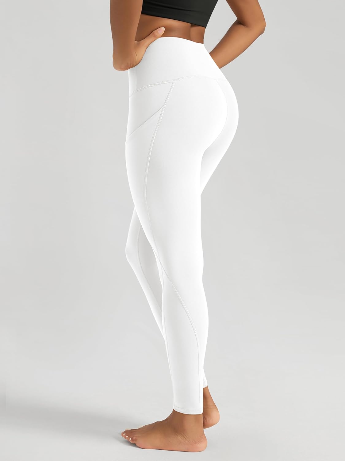 ODODOS Women's High Waisted Yoga Leggings with Pockets, Tummy Control Non See Through Workout Athletic Running Yoga Pants - Image 2