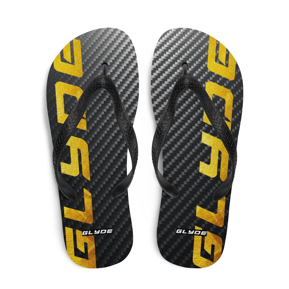 Glyde Black & Gold Print Flip Flops. Womens & Mens Flip Flops Made with Rubber Soles. Perfect for Garden, Holiday & Beach Days. Available in Small Medium & Large. with Black Y-Shaped Rubber Straps.
