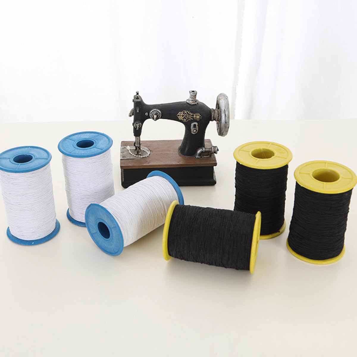 Hilo de Coser para Ropa y Disfraces 2 Piezas Núcleo Elástico de Poliéster Resistente para Pantalones Costura Uniforme Enredos Uso Confección y Color Color Aleatorio