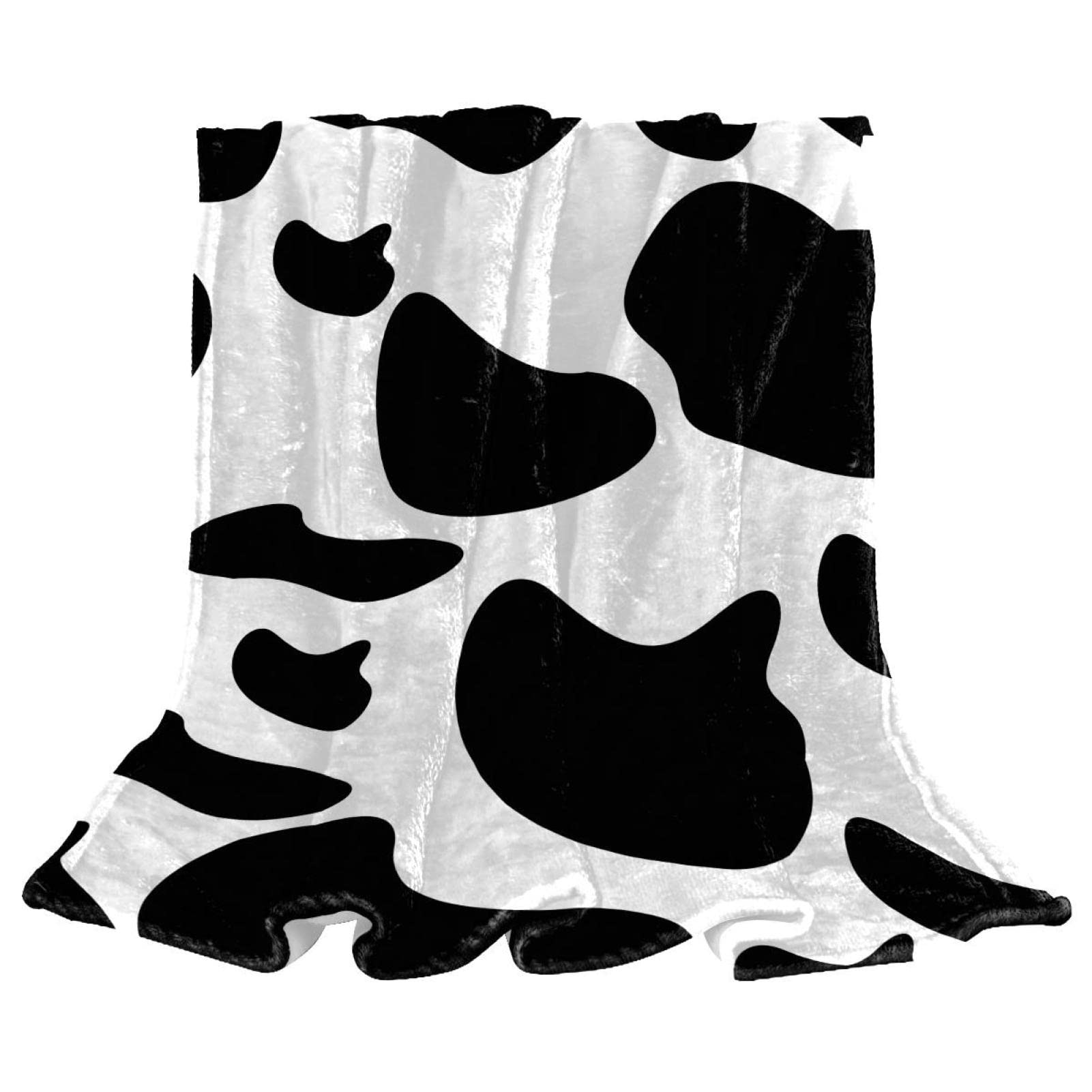 Couverture de lit motif vache pour des soirées cocooning et douillettes