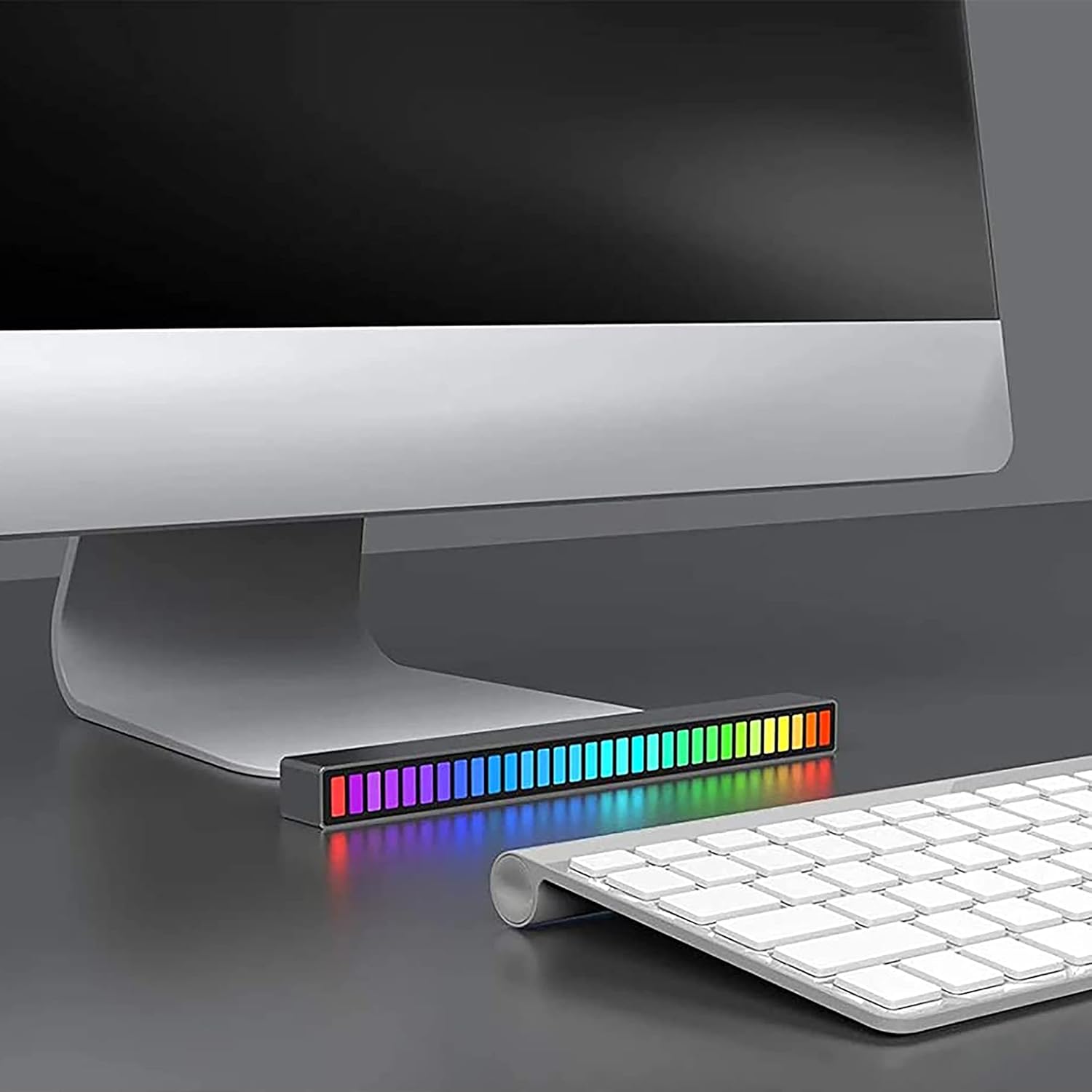 Monster LED light bar placed horizontally under a computer monitor