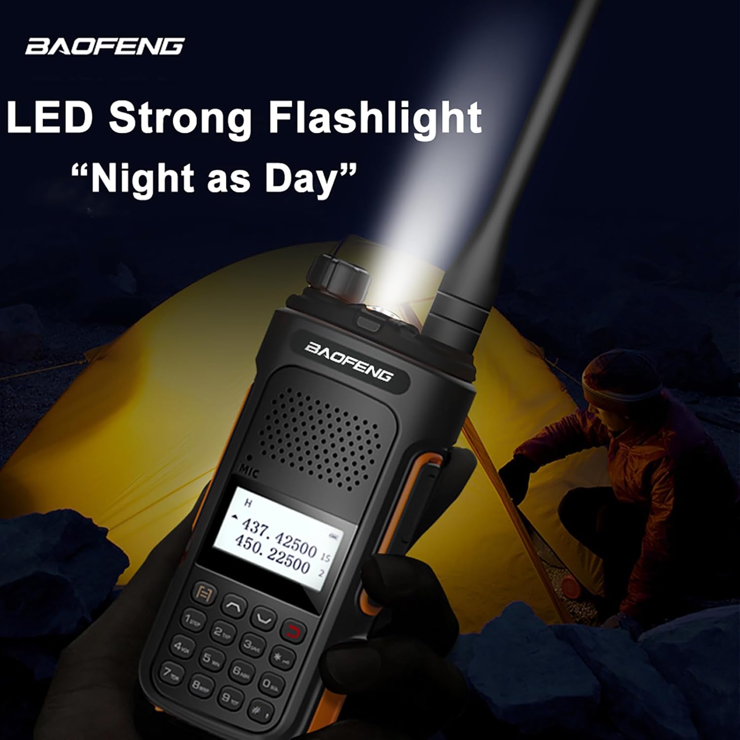 BAOFENG UV-10R radio with LED flashlight illuminated in a dark environment