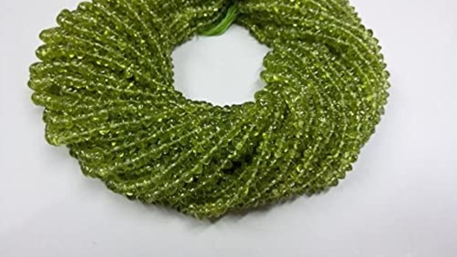Perles péridot en rondelle lisse de 4-5mm pour la création de bijoux artisanaux uniques