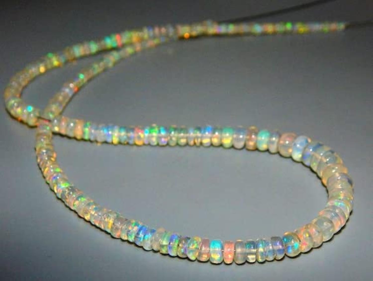 Opale éthiopienne véritable en perles lisses pour éviter les éclats sur vos colliers