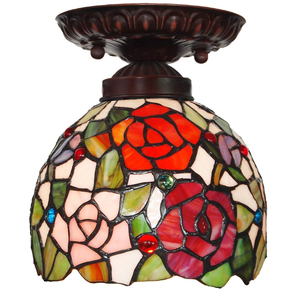 Plafonnier en verre teinté Tiffany rose pour éclairer un couloir sombre