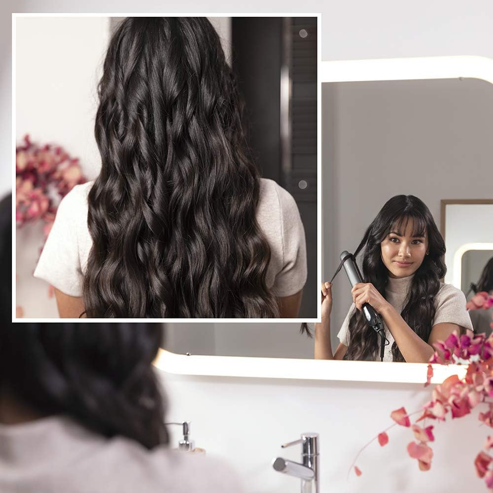 User creating waves with the Cecotec Bamba RitualCare 1100 hair straightener