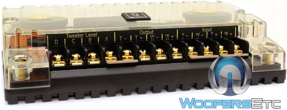 Samping view of the MB Quart QXD-216 crossover showing input and output terminals for woofer and tweeter, along with tweeter level adjustment options.