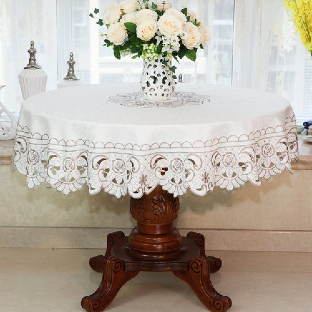 Nappe ronde pastorale en dentelle pour repas de famille chaleureux
